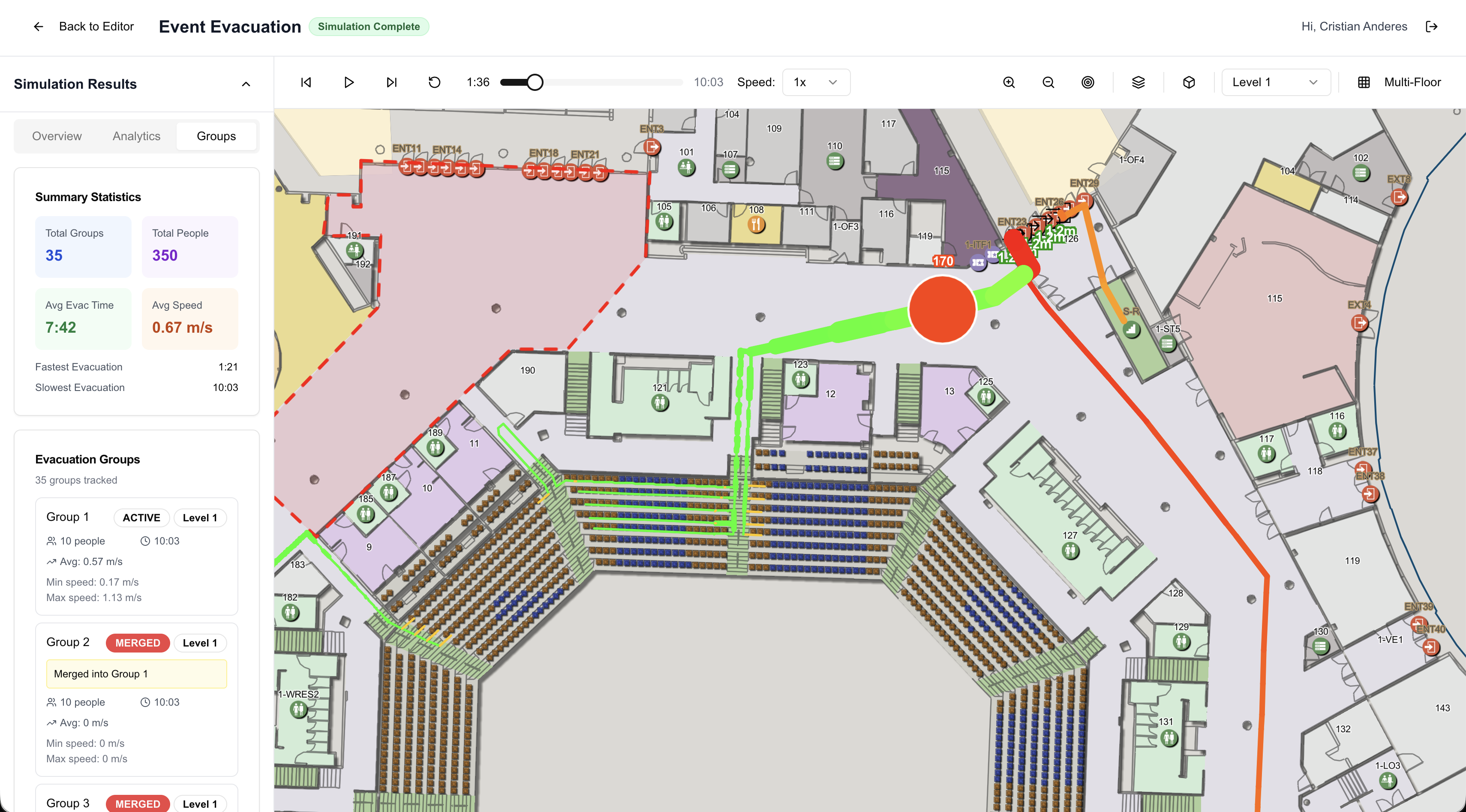 S/Planner: Playback mid-evacuation with color-coded routes and evacuee groups
